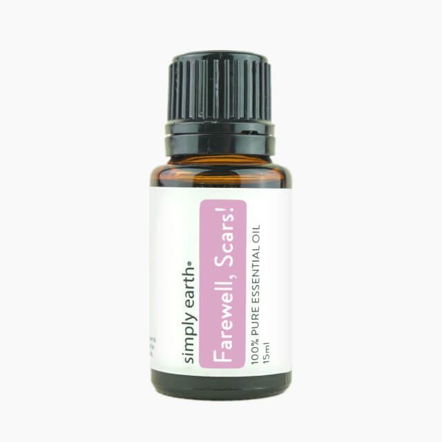 A bottle of simply earth farewell scars essential oil