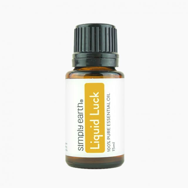 A bottle of liquid luck essential oil by simply earth