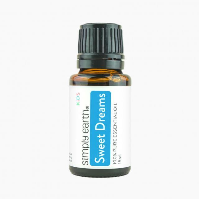 A bottle of simply earth sweet dreams essential oil