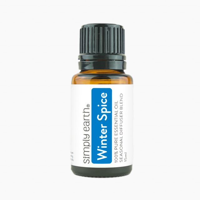 A bottle of simply earth winter spice essential oil