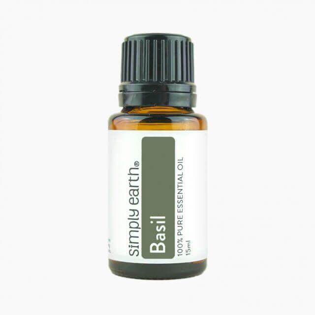 A bottle of basil essential oil from simply earth