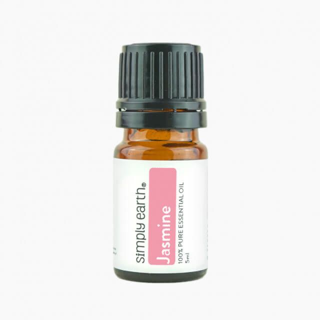 A bottle of simply earth jasmine essential oil