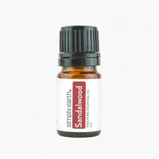 A bottle of sandalwood essential oil from simply earth