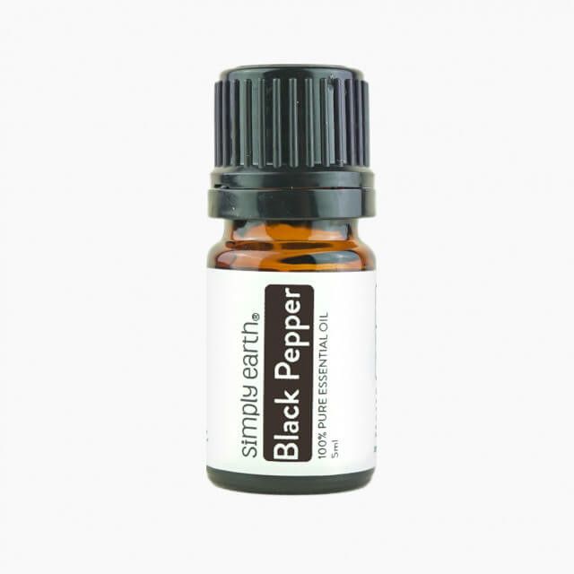 A bottle of black pepper essential oil from simply earth