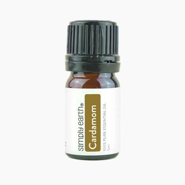 A bottle of cardamom essential oil from simply earth