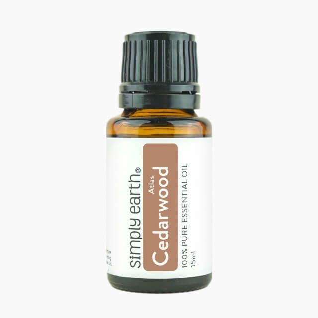 A bottle of simply earth atlas cedarwood essential oil