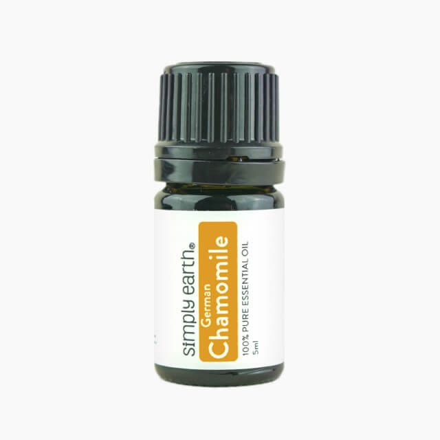 A bottle of chamomile essential oil from simply earth
