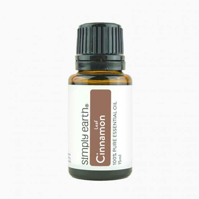 A bottle of simply earth cinnamon essential oil