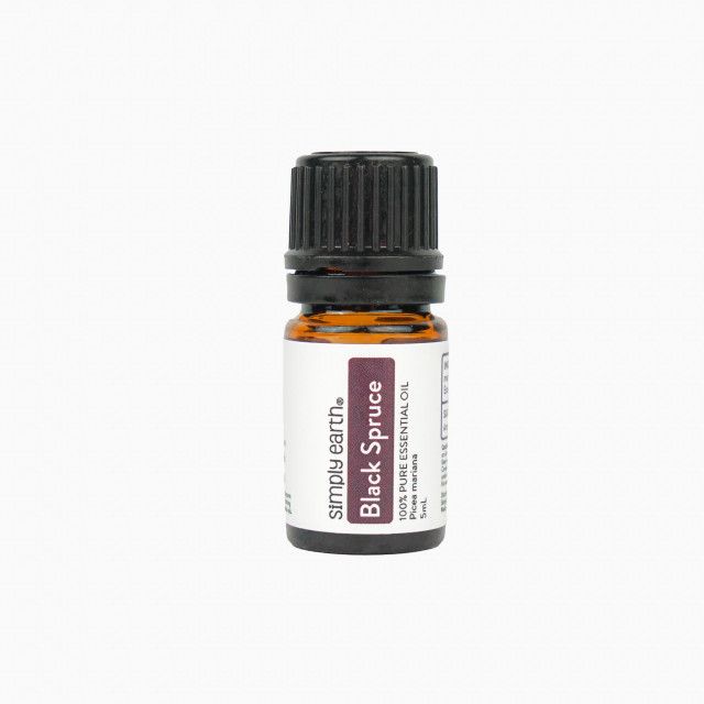 A bottle of simple earth black spruce essential oil