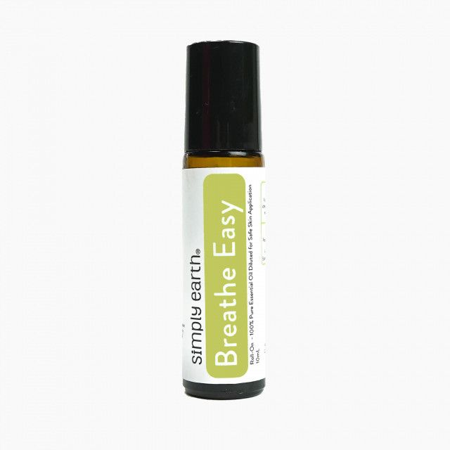 A bottle of simply earth breathe easy essential oil