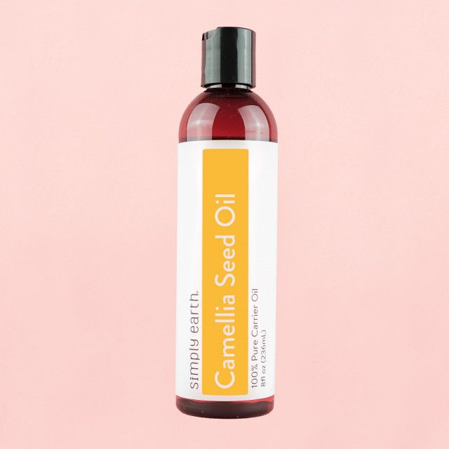 A bottle of camellia seed oil from simply earth