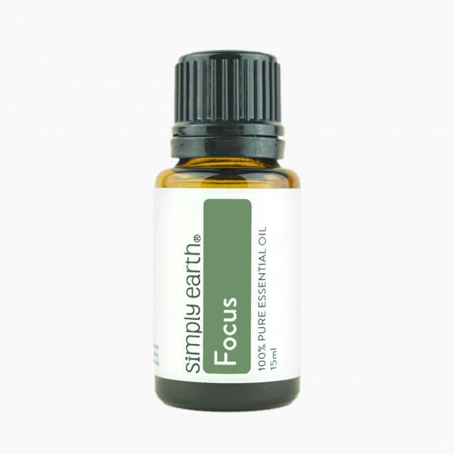 A bottle of simply earth focus essential oil