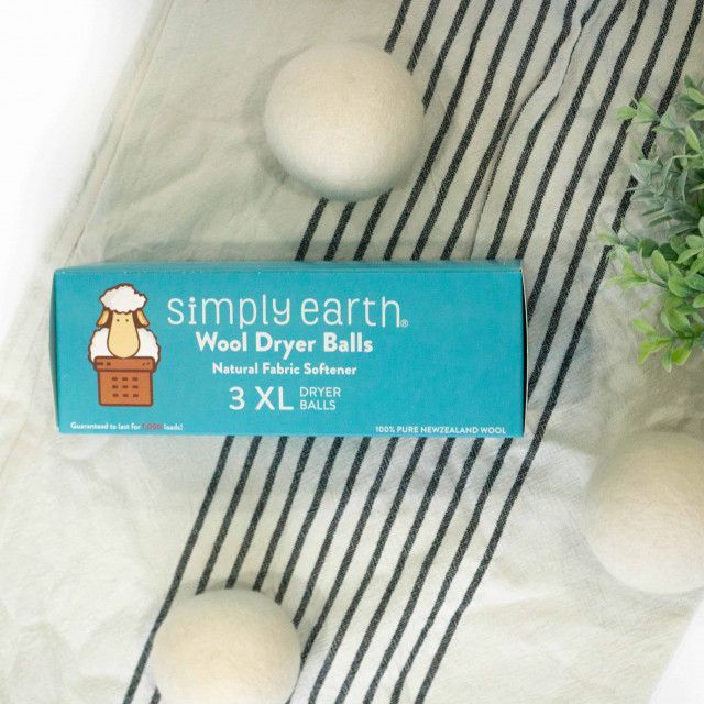 A box of simply earth wool dryer balls