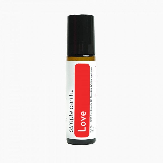 A bottle of simply earth love essential oil