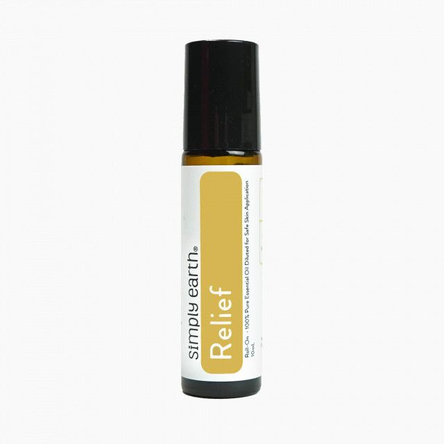 A bottle of simply earth relief essential oil