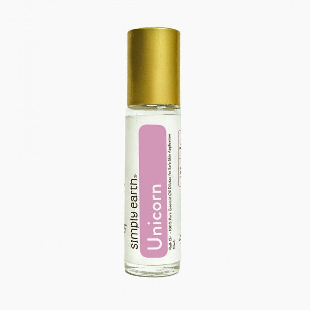 A bottle of simply earth unicorn essential oil