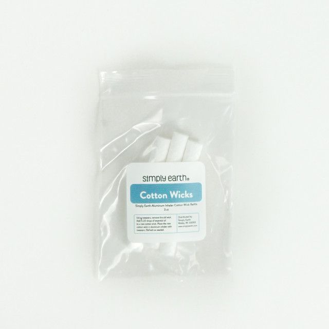 A bag of cotton wicks is sitting on a white surface.