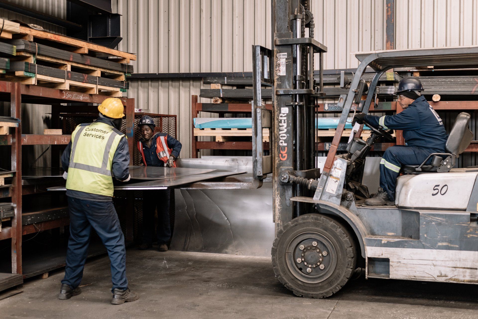njr workers with a steel sheet