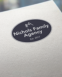 Oval Nichols Family Agency logo on a textured white surface, with “Est. 2011” in white text.