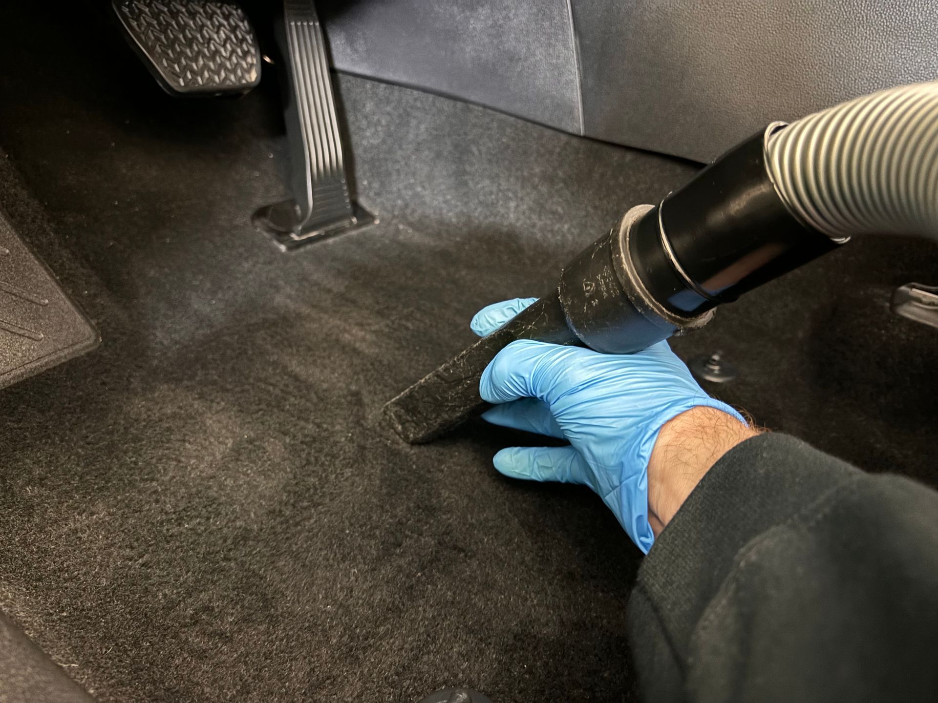 A Toyota RAV4 from Lehi getting vacuumed at Stokes Auto Spa as part of an interior detailing package