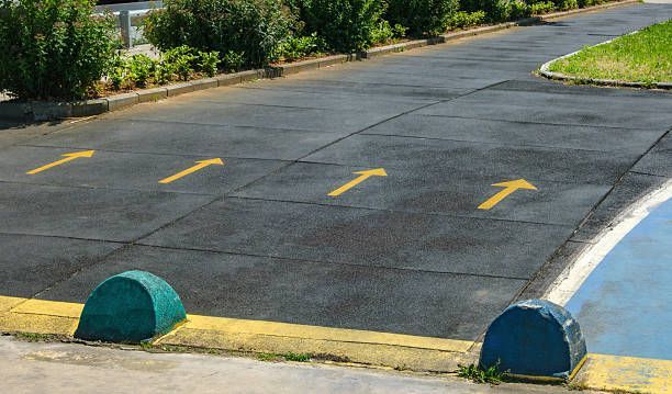 driveway sealcoating vs resurfacing