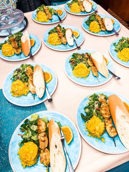 Plate of grilled chicken rice and salad served for Lunch on Random Wind Charters