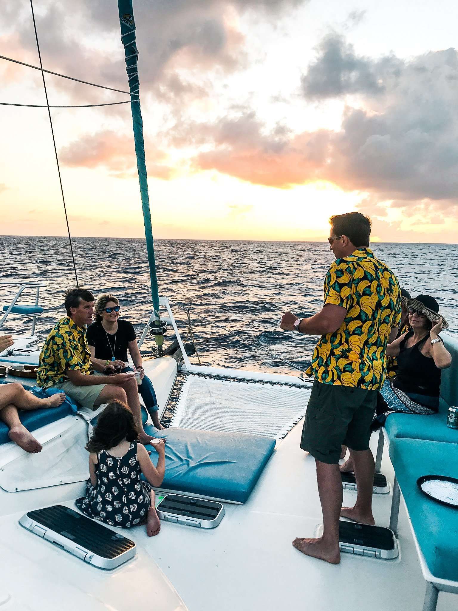 Guests enjoying a sunset cruise on Random Wind