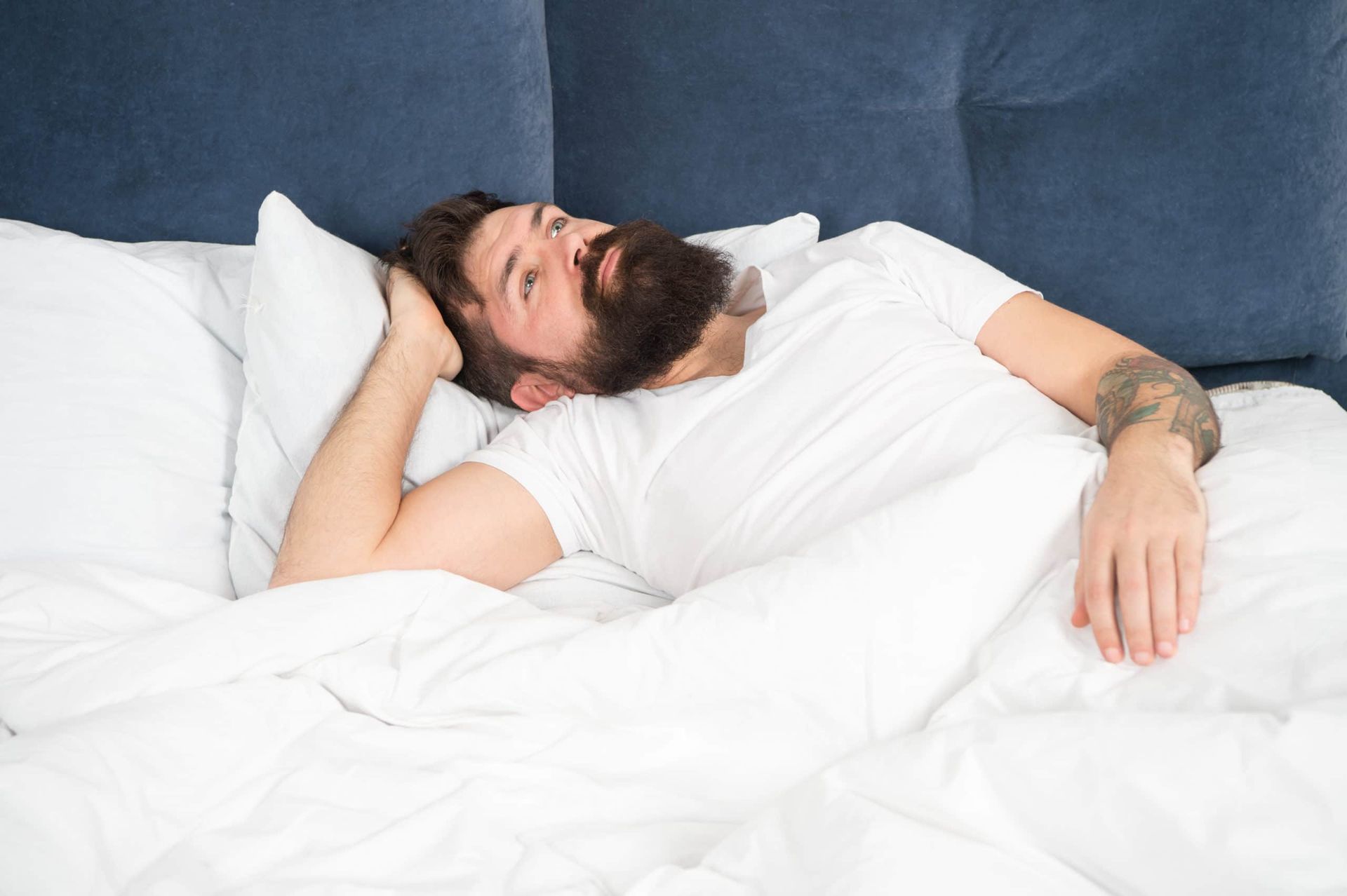 Person with their neck on a pillow