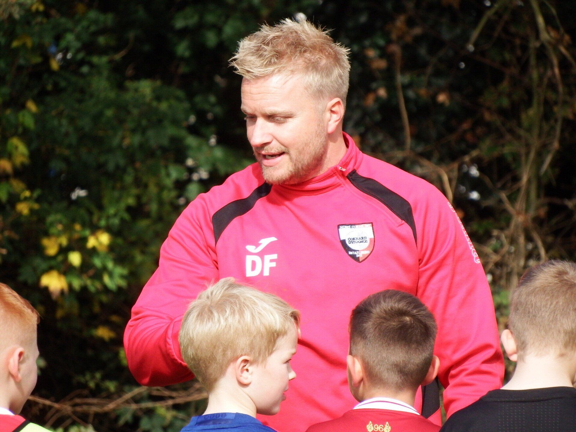Darren Frost managing football team