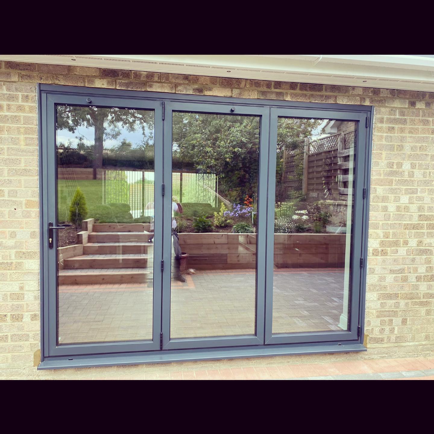 Double glazed BY-FOLD doors installed at domestic property near Sudbury, Suffolk by Suffolk Doors and Windows