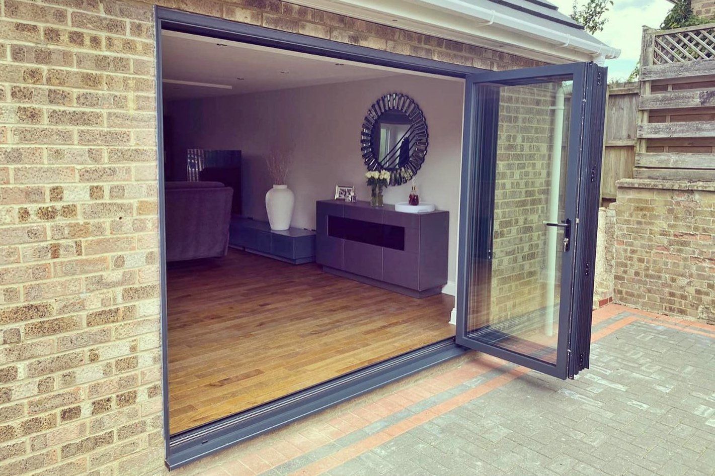 Double glazed BY-FOLD doors installed at domestic property near Sudbury, Suffolk by Suffolk Doors and Windows