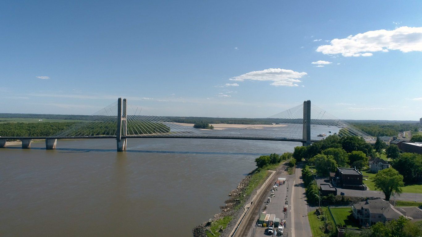 An aerial view of a bridge over a large body of water.