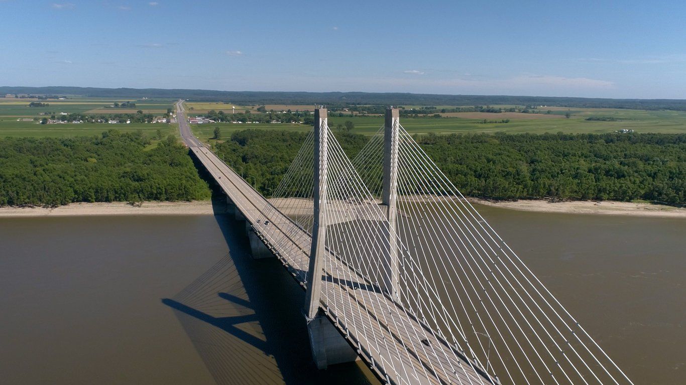 An aerial view of a bridge over a large body of water.