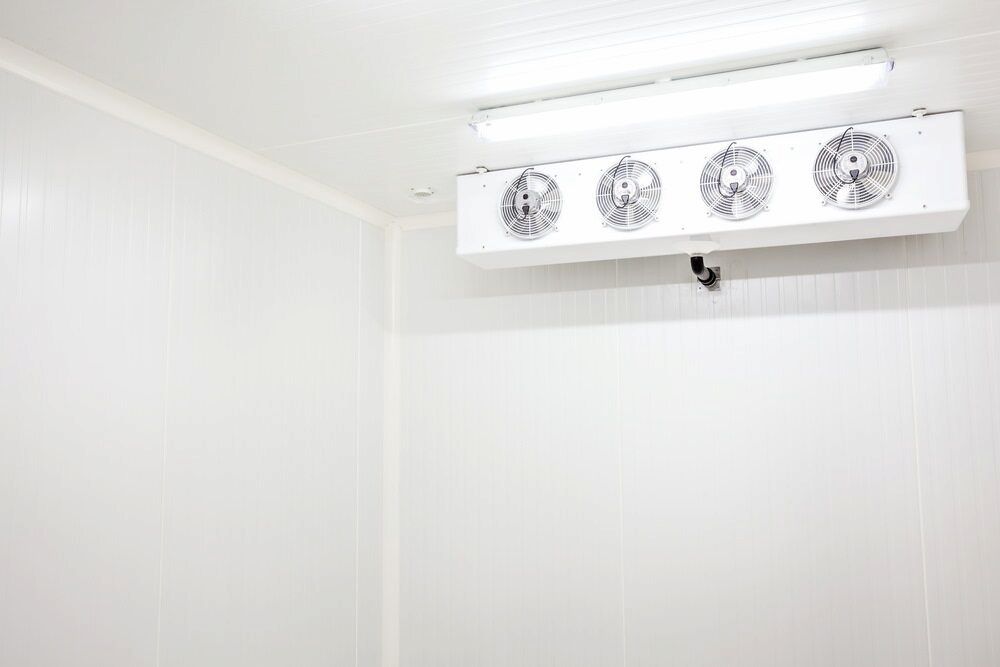 A Refrigerator With Four Fans Hanging From the Ceiling — Complete Airconditioning & Refrigeration in Darwin, NT