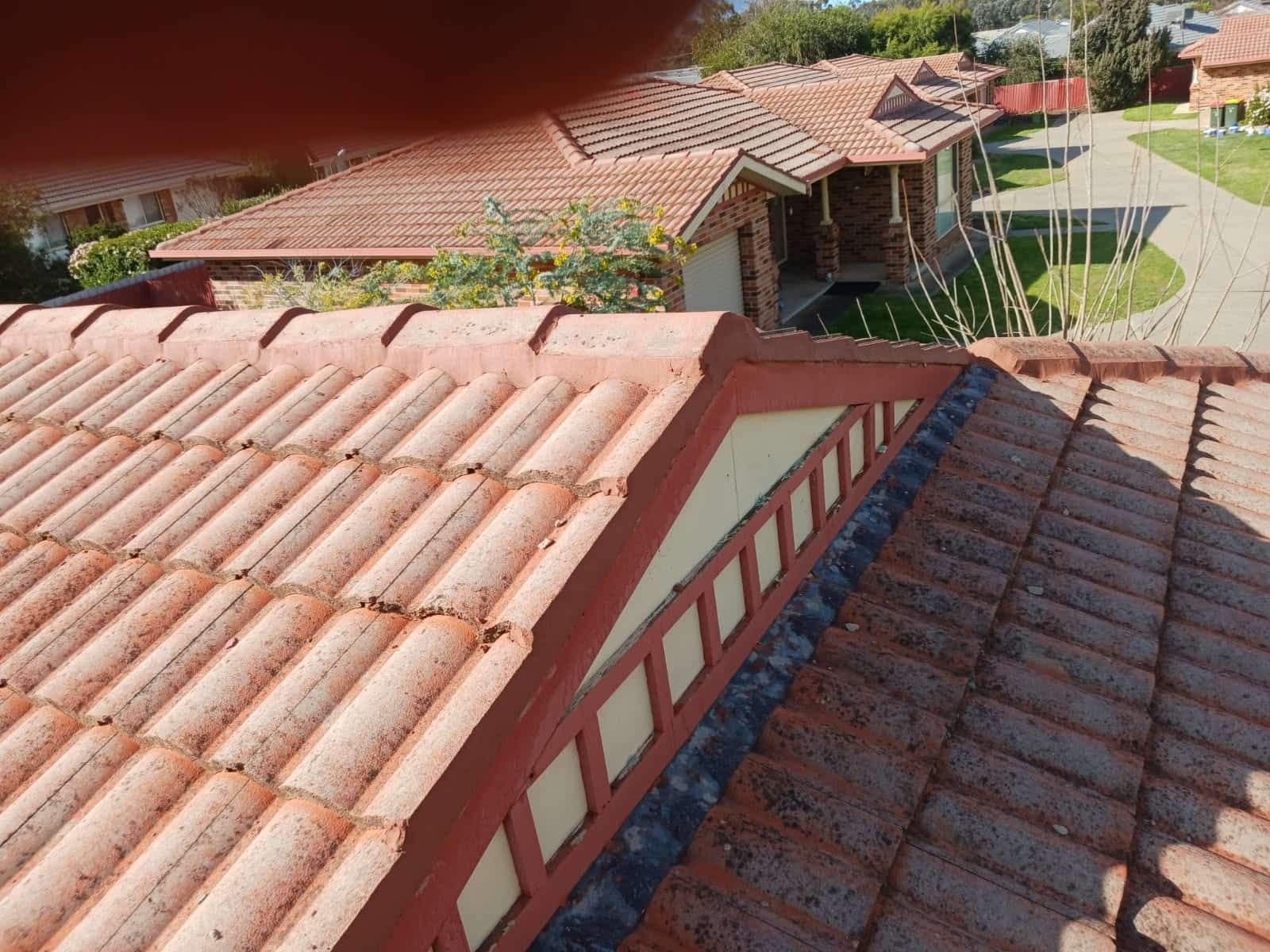 An Aerial View of a Tiled Roof of a House — Wagga Roof Repairs In Mount Austin, NSW