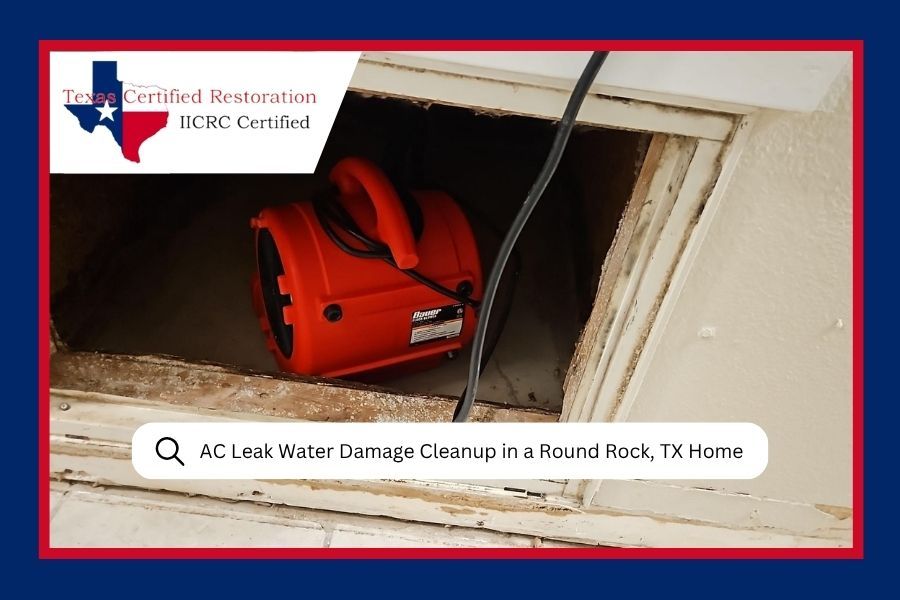 Red water extraction fan drying a damaged wall, with water damage restoration branding and call-to-action text