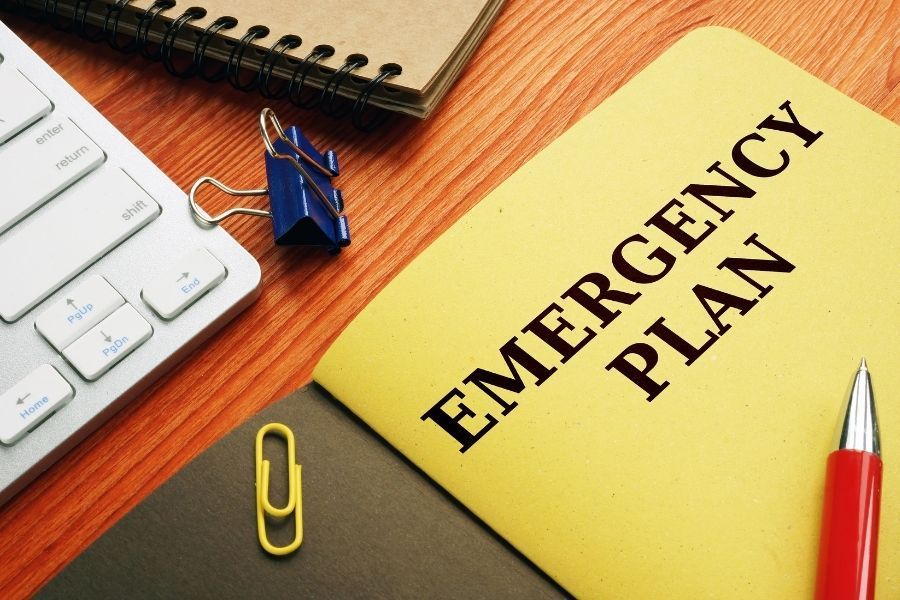 Emergency preparedness plan document on a desk ready for storm planning