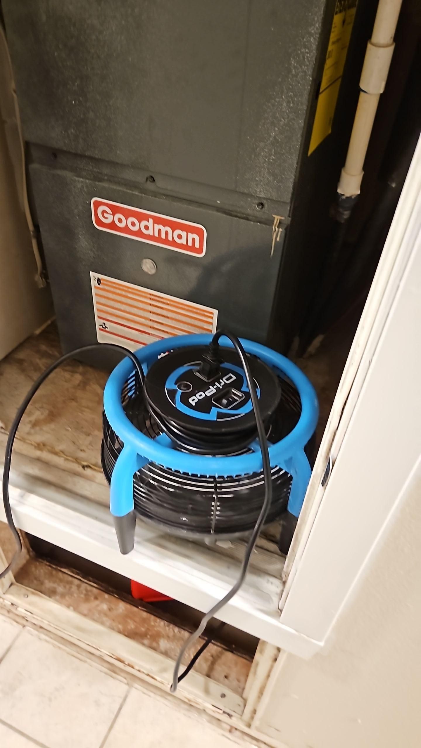 AC closet water damage drying process with commercial equipment