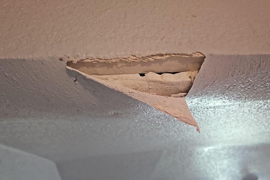 Ceiling damage caused by storm-related water intrusion in a Central Texas home