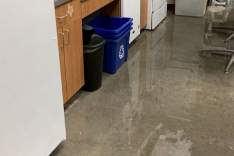 Flood damage affecting flooring and walls in a Central Texas property