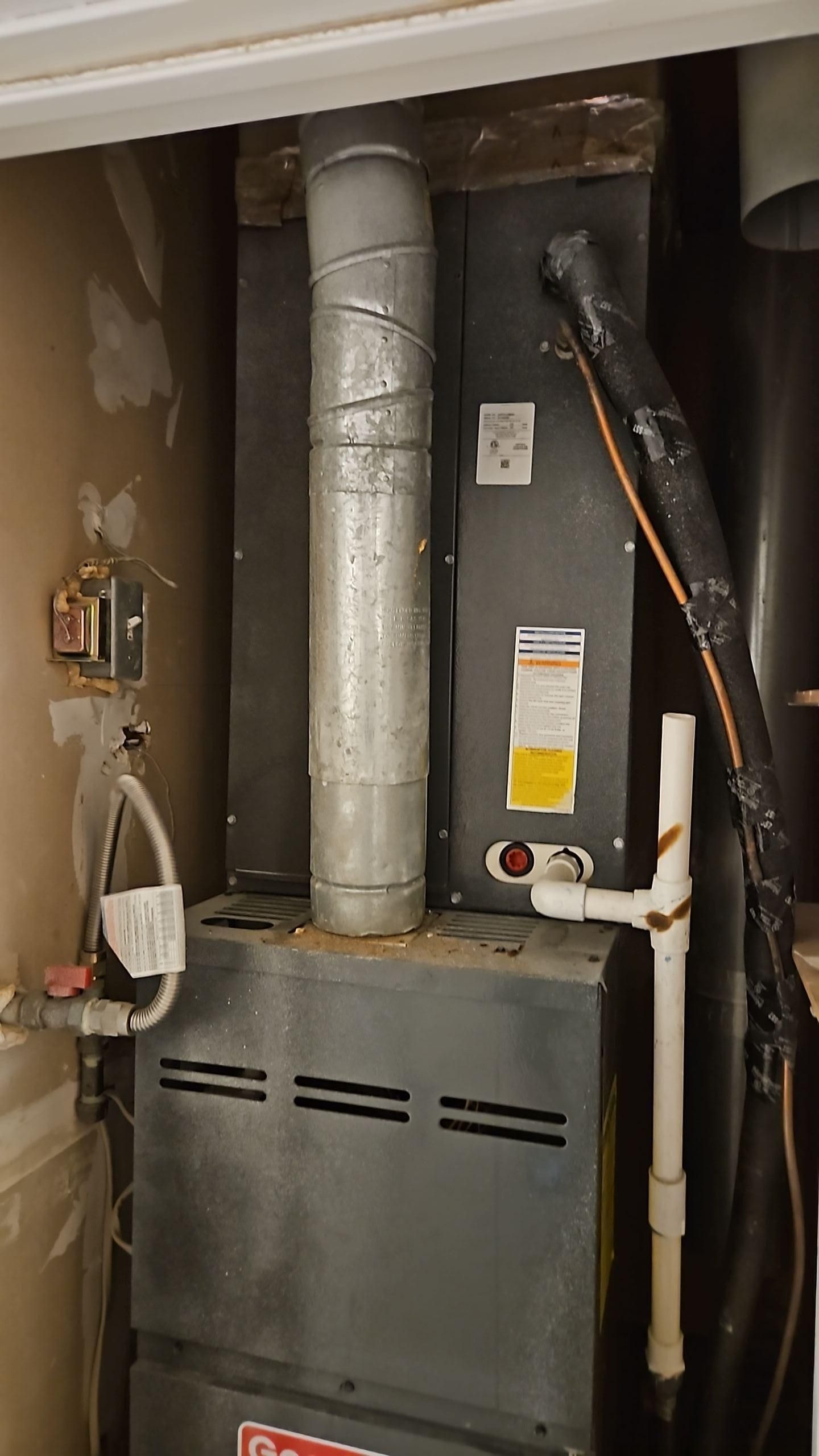 HVAC system water damage showing moisture spread from condensate leak