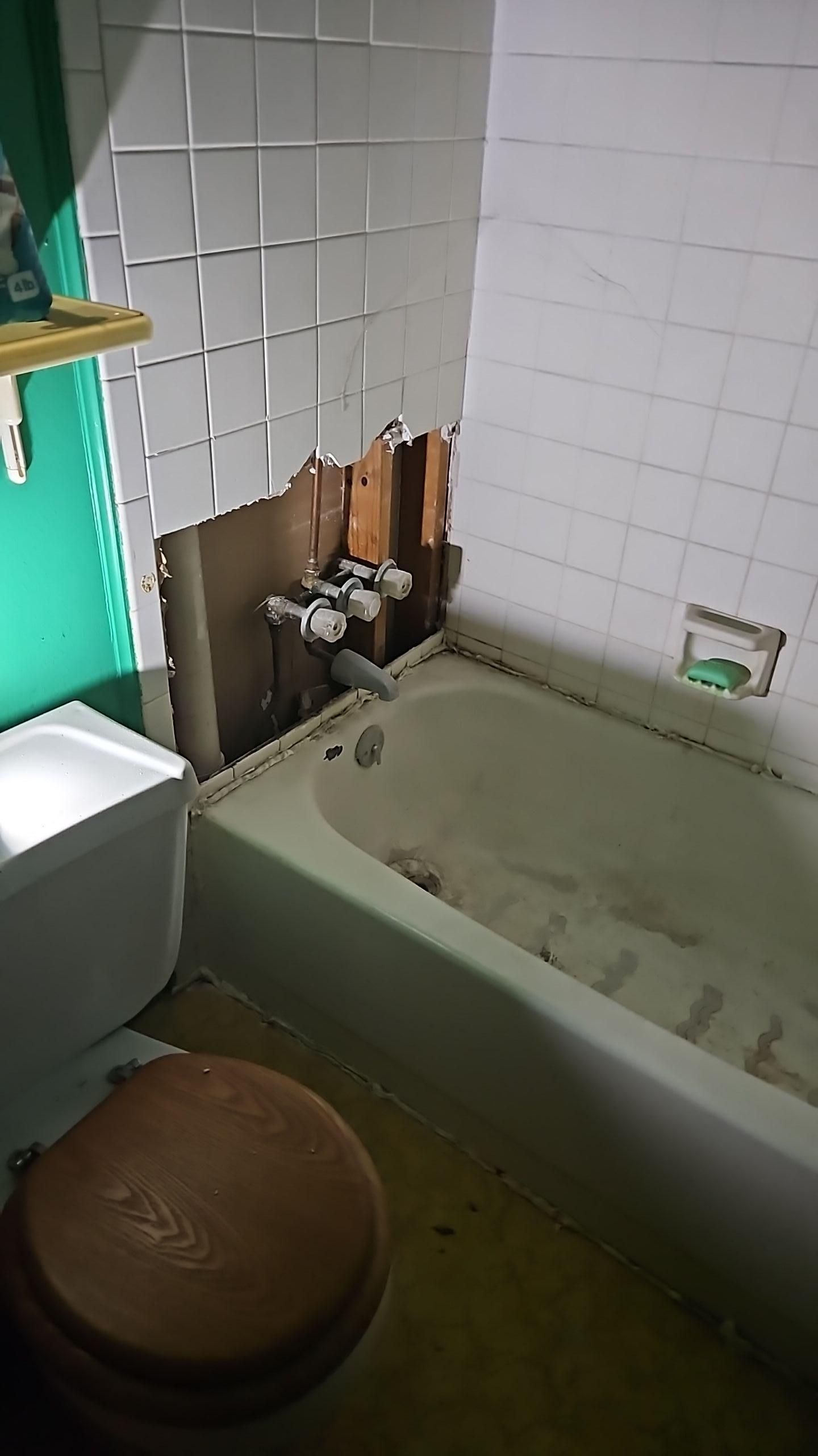 Mold contamination behind wall materials requiring full drywall removal in multi-room remediation