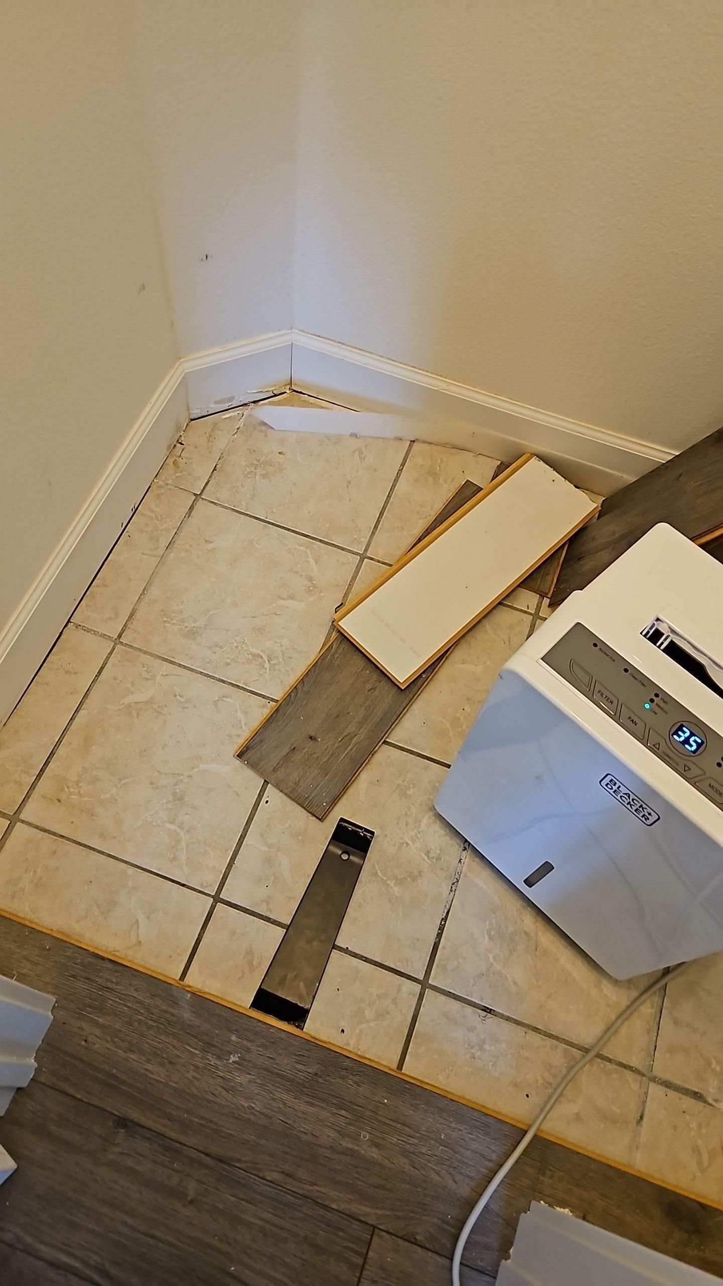 Water damage in office closet caused by AC leak in Round Rock TX home