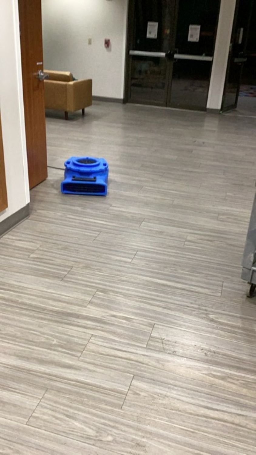 Church lobby and reception area with drying equipment and LVP flooring