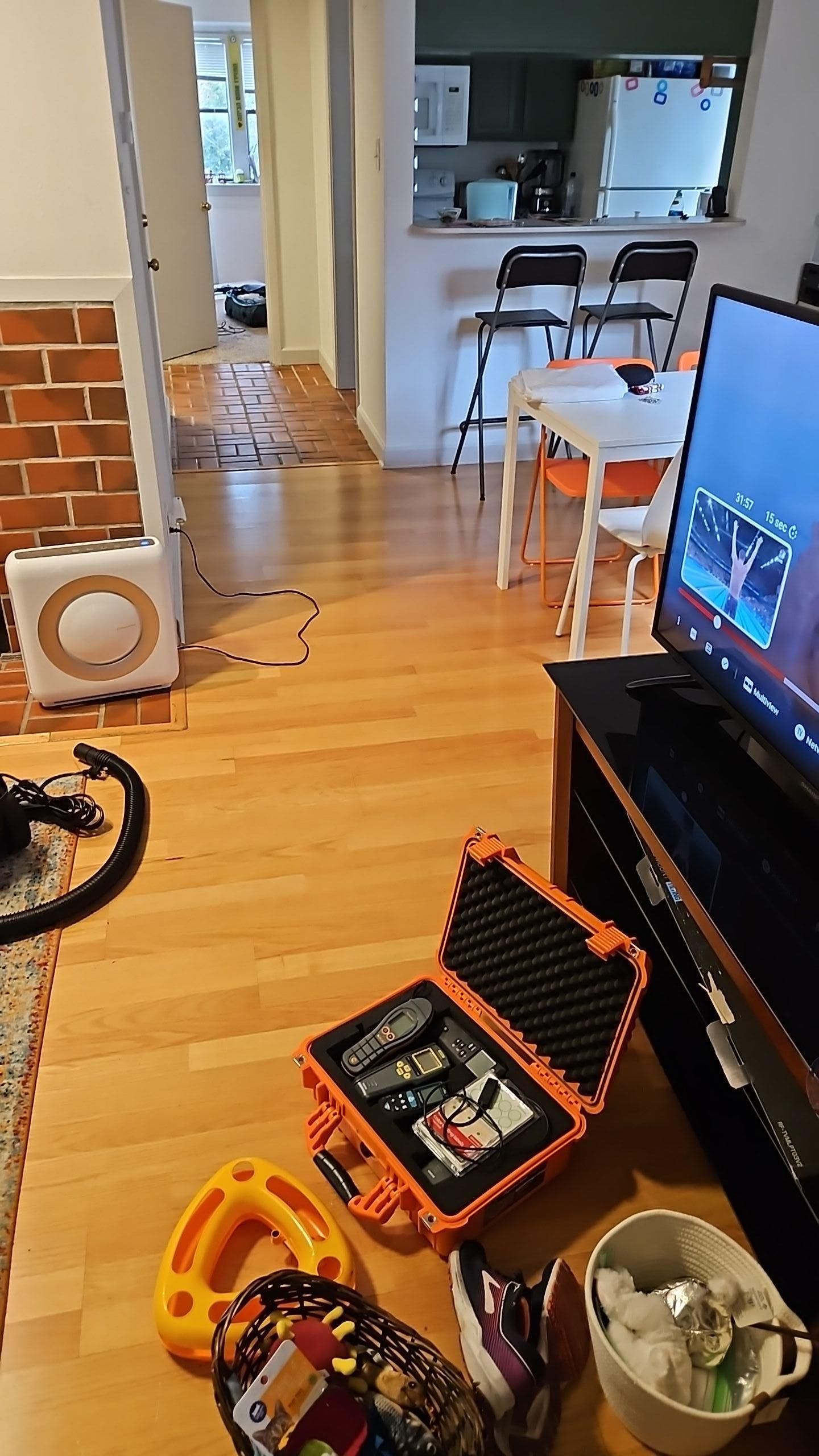 Professional water damage restoration drying equipment set up in Austin TX living room