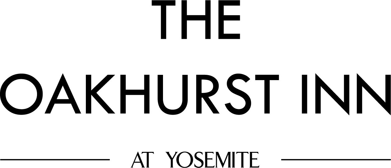 The Oakhurst Inn at Yosemite logo