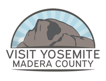 Logo Depicts a stylized mountain within a blue arch with radiating lines, with the text