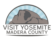 Logo Depicts a stylized mountain within a blue arch with radiating lines, with the text