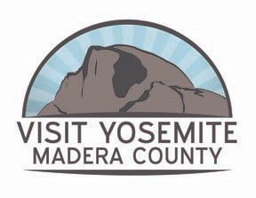 Visit Yosemite Madera County logo with a mountain against a blue sky, beneath text.