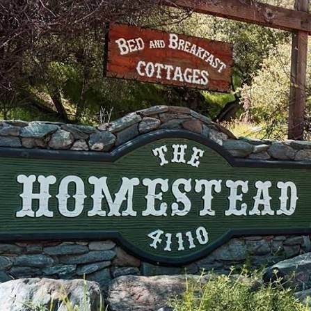 The Homestead Cottages logo